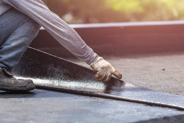 Professional Basement Waterproofing technician working in Severn, MD